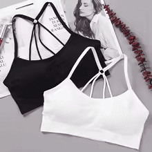 Black and white strappy high support sports bras